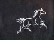 Animals/019EmbroideredWhiteHorseOnBlackDetail.jpg