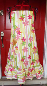 aprons/DLA0125ApronFabricRustOrangesLemonsDetail.jpg